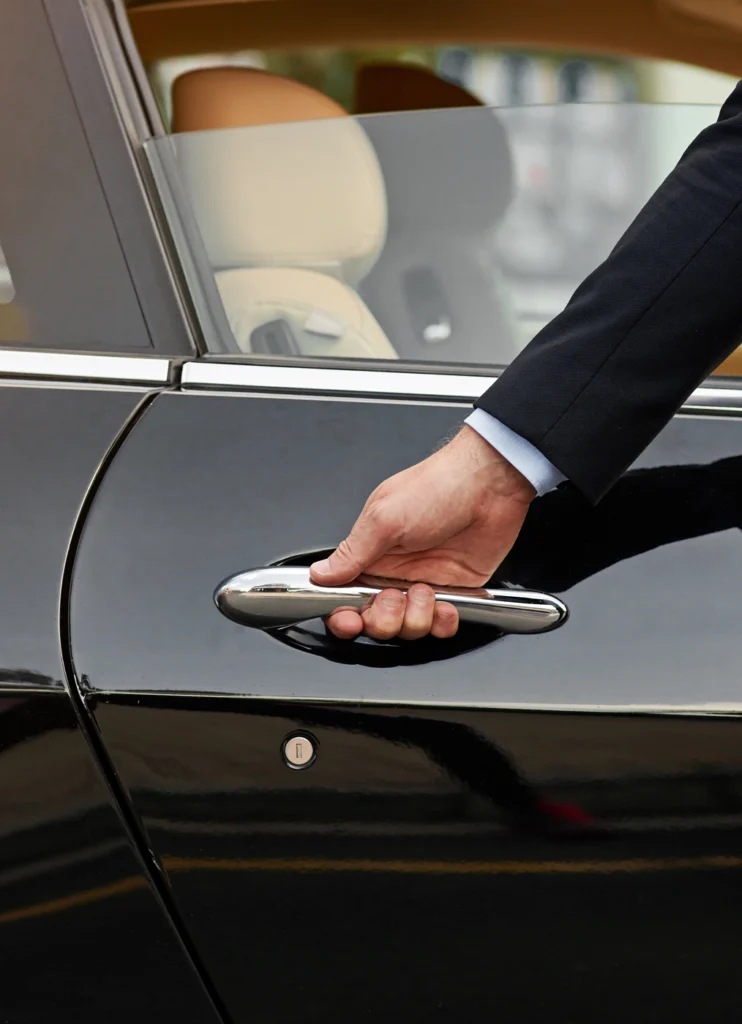 Hand opening luxury car door handle.